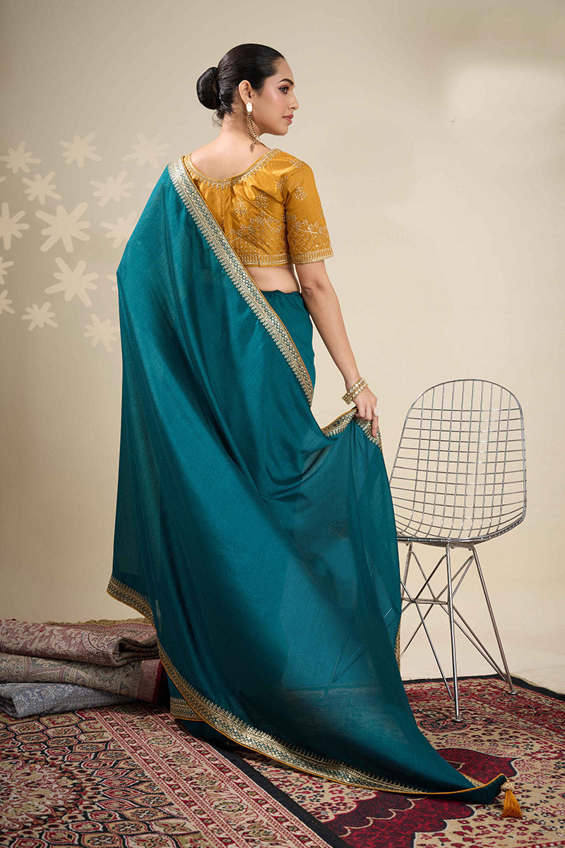 Festive Teal Saree with Golden Detailing – Perfect for Weddings RTI