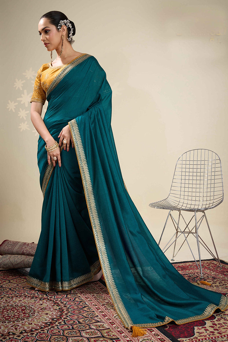 Festive Teal Saree with Golden Detailing – Perfect for Weddings RTI
