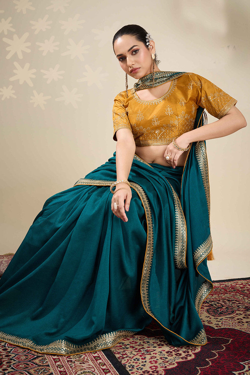 Festive Teal Saree with Golden Detailing – Perfect for Weddings RTI