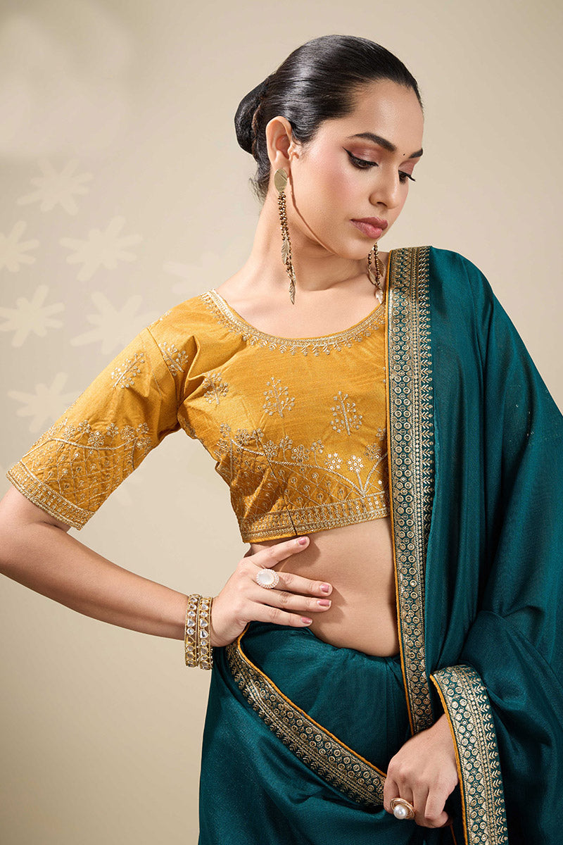 Festive Teal Saree with Golden Detailing – Perfect for Weddings RTI