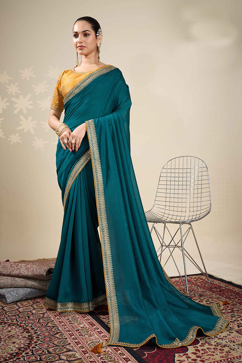 Festive Teal Saree with Golden Detailing – Perfect for Weddings RTI