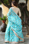 Turquoise Bloom Floral Lehenga Set with Champagne Embroidered Blouse RTI
