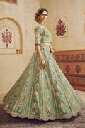 Pastel Green Embroidered Net Lehenga Choli with Floral Motifs RTI