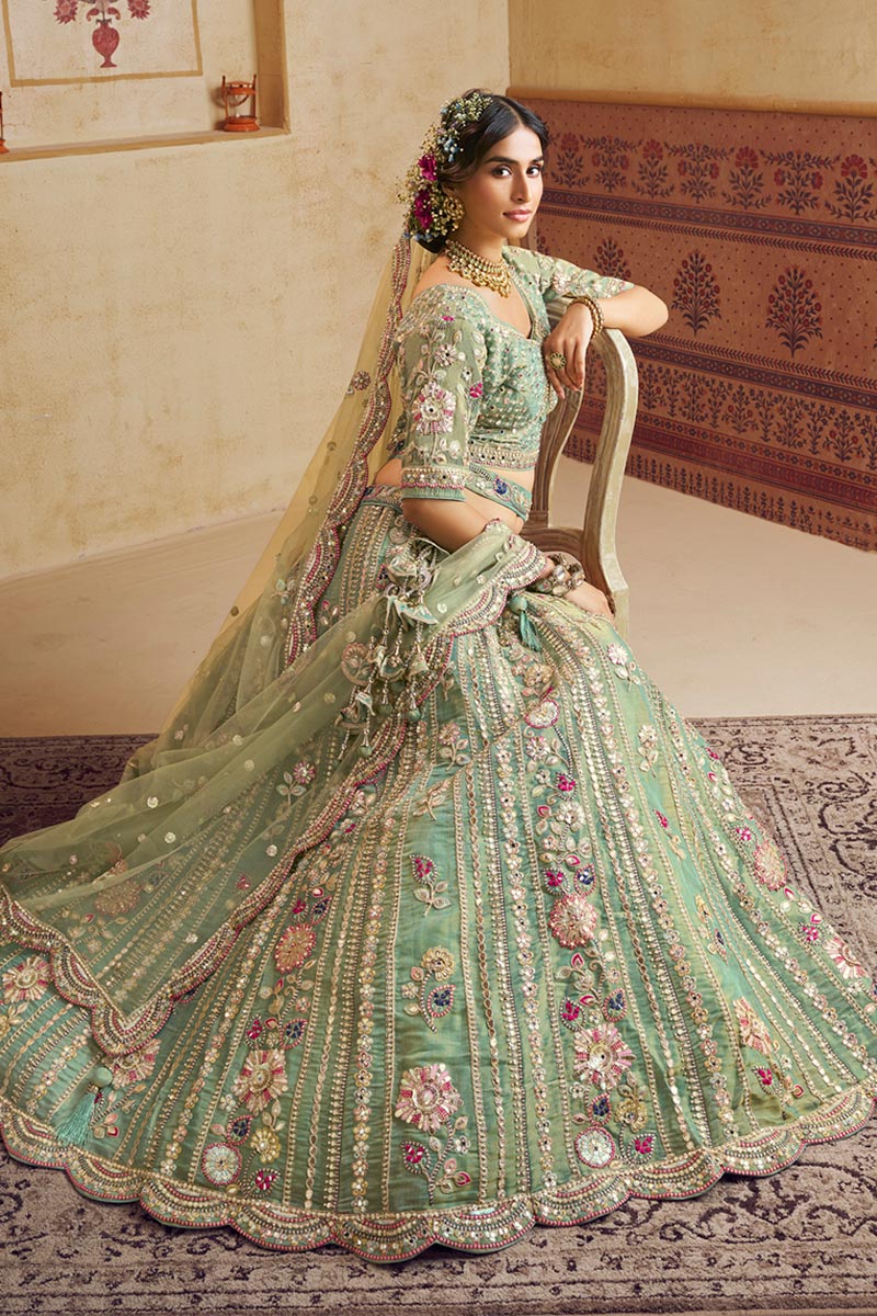 Pastel Green Embroidered Net Lehenga Choli with Floral Motifs RTI