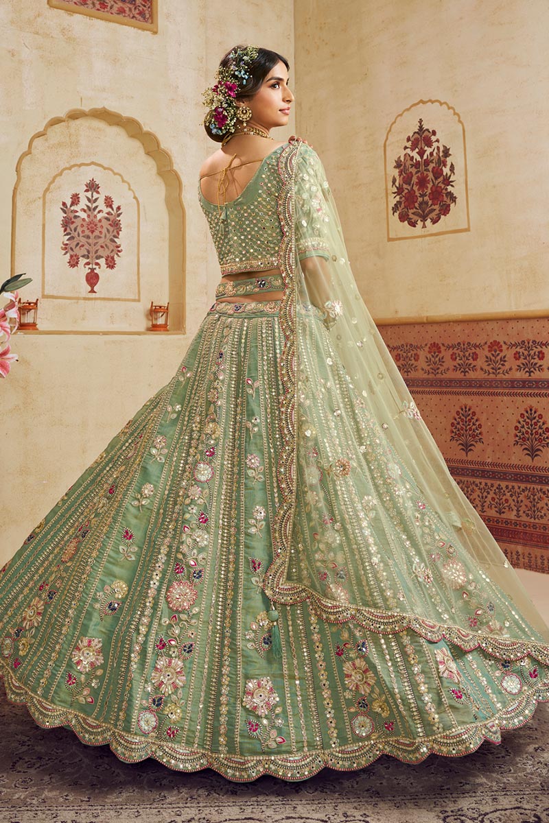 Pastel Green Embroidered Net Lehenga Choli with Floral Motifs RTI