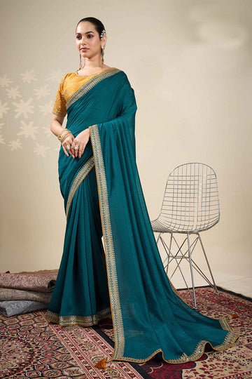 Festive Teal Saree with Golden Detailing – Perfect for Weddings RTI