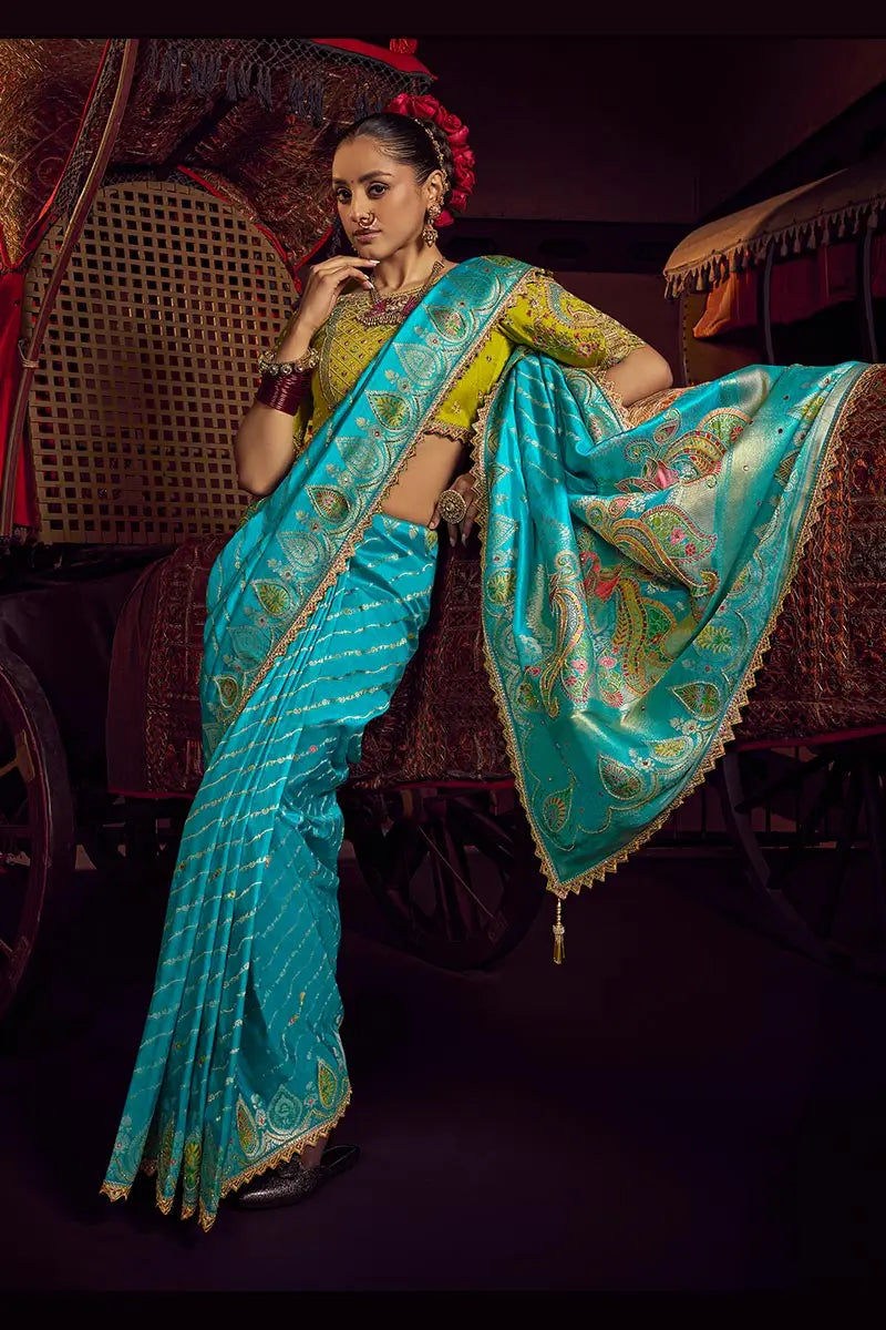 Aqua Blue Patola Banarasi Saree with Golden Zari Weave – Bridal & Festive Wear VA