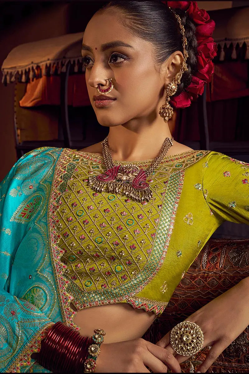 Aqua Blue Patola Banarasi Saree with Golden Zari Weave – Bridal & Festive Wear VA