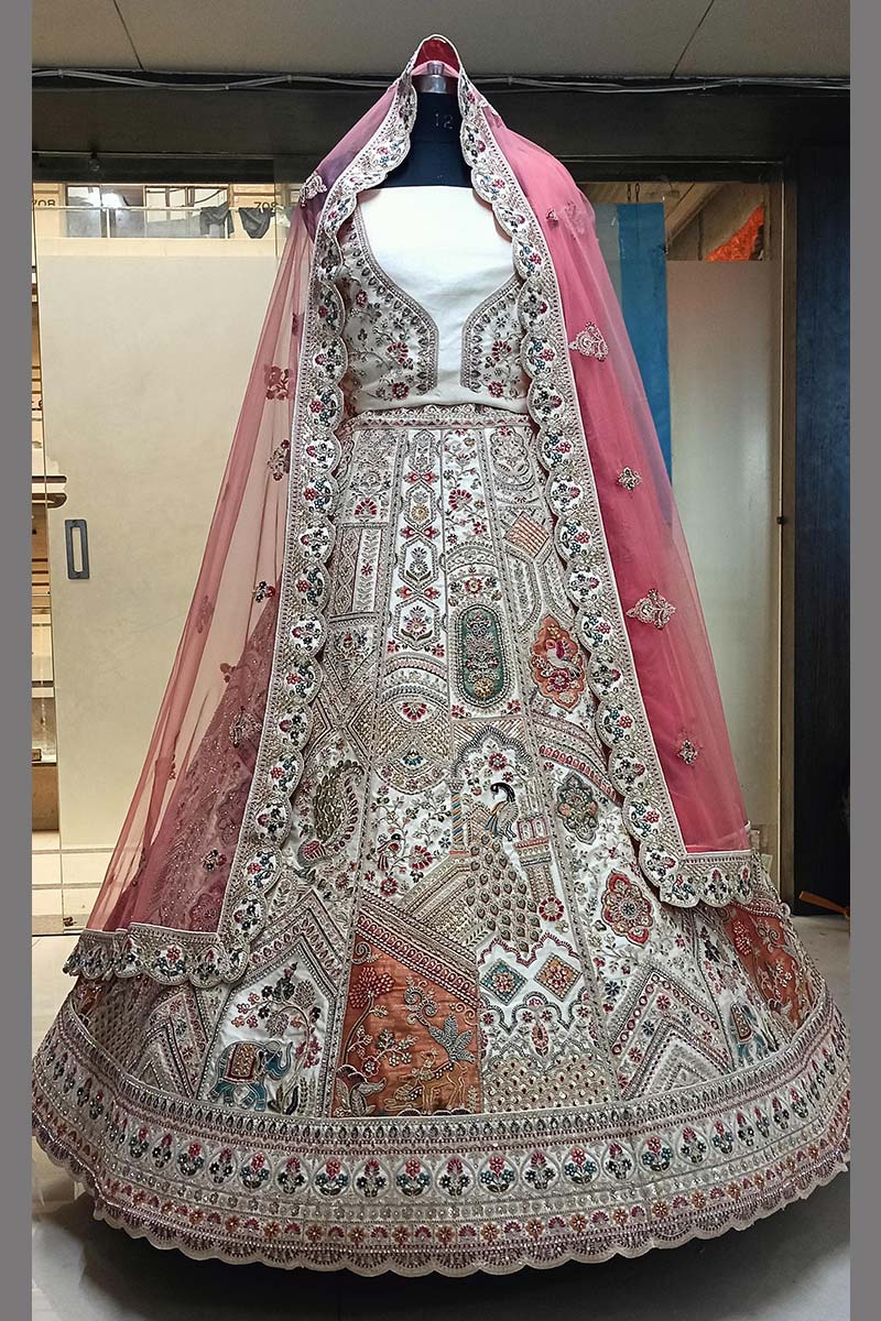 Intricately Embroidered Cream Zari Lehenga with Royal Motifs KF