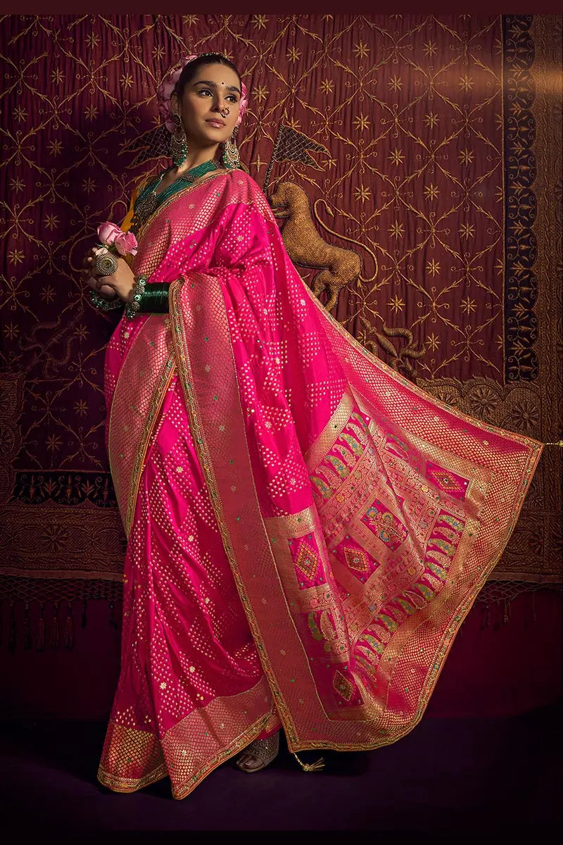 Rani Pink Patola Banarasi Saree with Golden Zari Weave – Bridal & Festive Wear VA