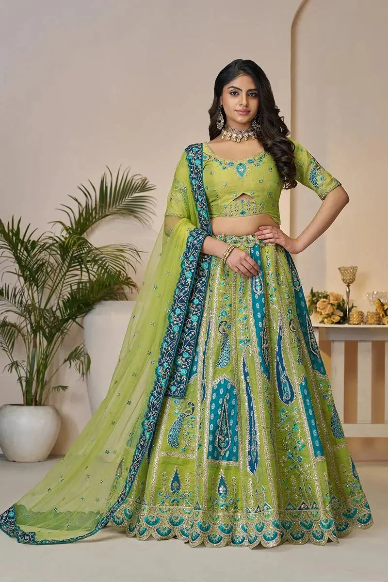Royal Green Bridal Soft Net Lehenga with Peacock & Paisley Motifs and Heavy Embroidery KSR