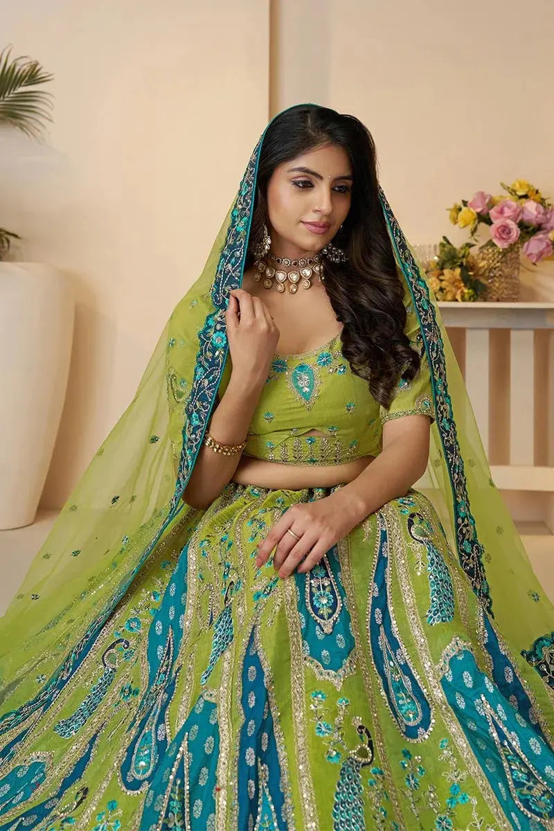 Royal Green Bridal Soft Net Lehenga with Peacock & Paisley Motifs and Heavy Embroidery KSR