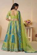 Royal Green Bridal Soft Net Lehenga with Peacock & Paisley Motifs and Heavy Embroidery KSR