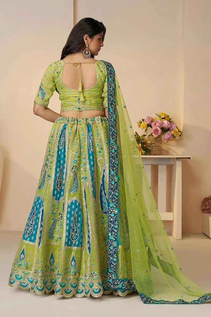 Royal Green Bridal Soft Net Lehenga with Peacock & Paisley Motifs and Heavy Embroidery KSR