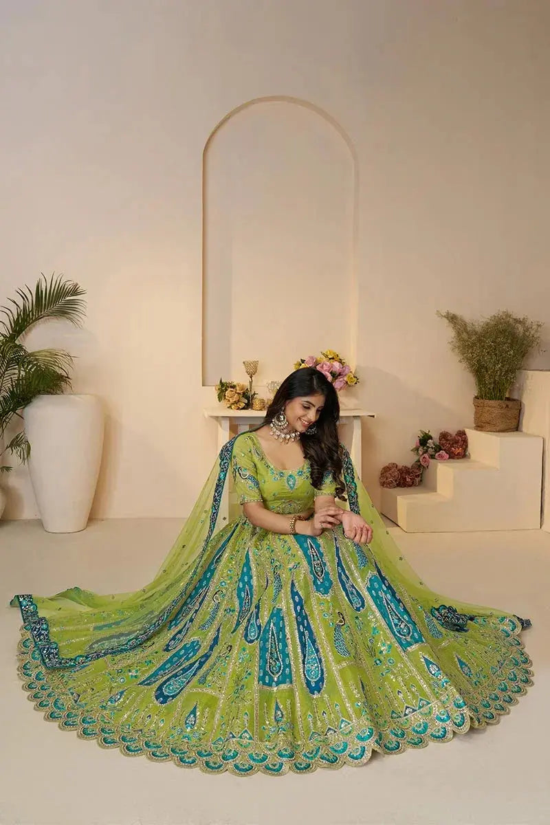 Royal Green Bridal Soft Net Lehenga with Peacock & Paisley Motifs and Heavy Embroidery KSR
